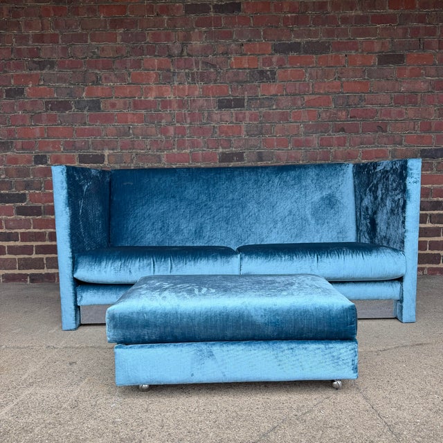 This is a stunning custom Adrian Pearsall shelter sofa and ottoman. It features three feet high arms and back with a low...
