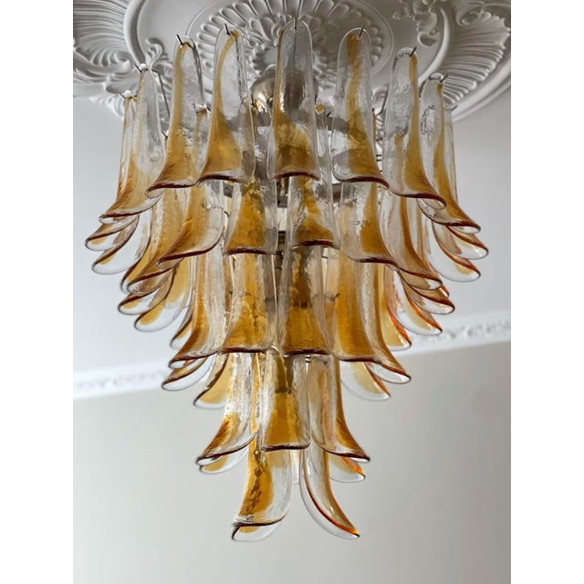 Pair of two Bold and Colorful Amber Colored Murano Chandeliers. Petal Formed Glass Prisms in Traditional Italian Mid-...