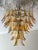 Pair of two Bold and Colorful Amber Colored Murano Chandeliers. Petal Formed Glass Prisms in Traditional Italian Mid-...