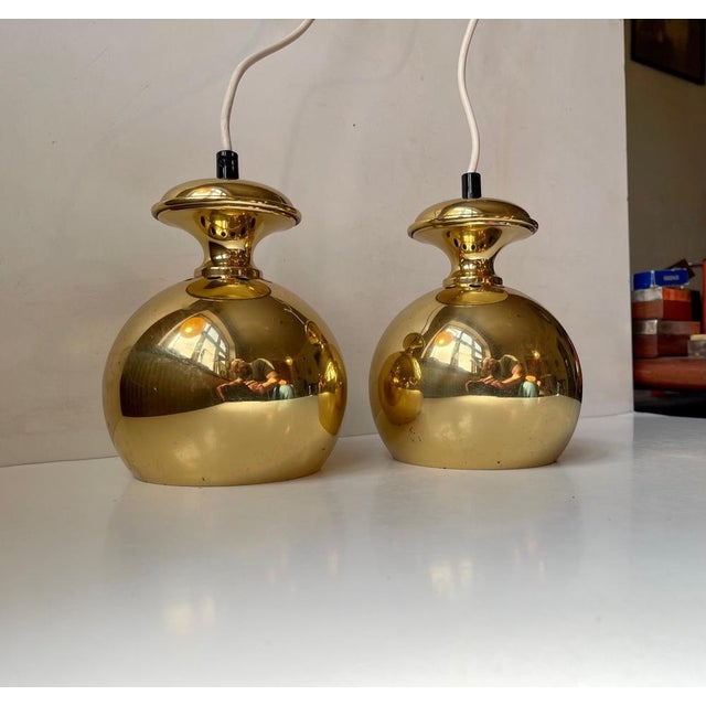 Pair of bell shaped pendant ceiling lights designed by Hans-Agne Jakobsson för Markaryd Sweden, 1960s. They feature solid...