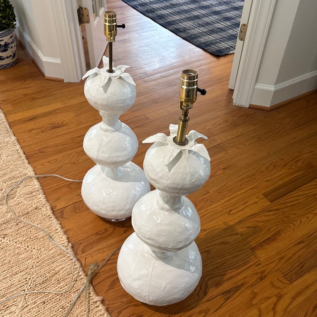 This pair of vintage “stacked gourd” lamps are painted in Benjamin Moore White Dove and can be repainted in any color....