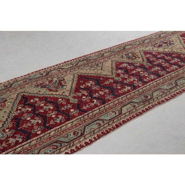 Made with hand-knotted wool in Turkey, this 5x14 antique Ghiordes runner rug is a rare and exciting new addition to Rug &...