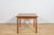 The square extendable table made of teak was produced in Denmark in the 1960s. The table has reinforced, profiled edges....