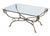 A fine French low cocktail or coffee low table from the Mid-Century Modern era, in the manner of Maison Jansen - featuring...