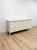 This stunning vintage Thomasville Paoletti collection faux bamboo 9-drawer dresser is a genuinely exceptional Hollywood...
