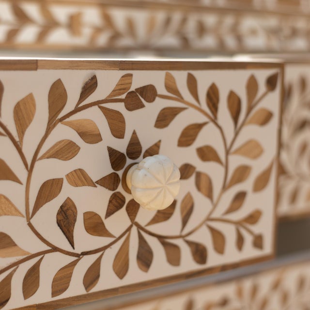 The Arabesque Teak Wood Inlay Four-Drawer Chest explores the decorative traditions of floral ornamentation through the...