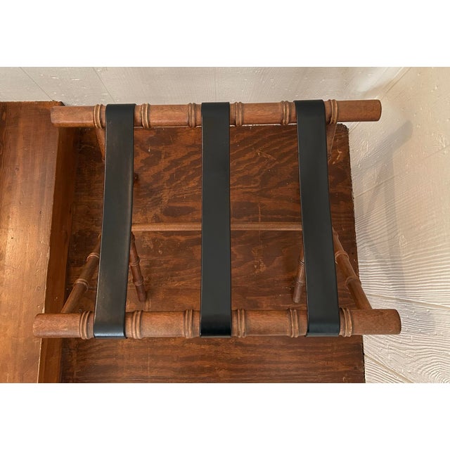Cool vintage brown faux bamboo folding luggage rack with thick black leather straps. 22" long, 17" wide, and 20.5" tall.