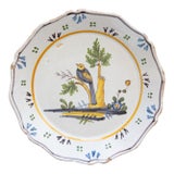 18th Century French Nevers Polychrome Tin-Glazed Faïence Bird Plate For Sale