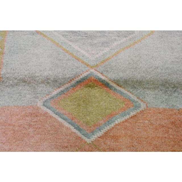 Hand-knotted with care using traditional rug making techniques, this wool rug blends timeless craftsmanship with a modern...