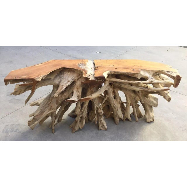 Presenting Contemporary Natural Teak Wood Live Edge Console Table. This striking piece embodies the raw, organic allure of...