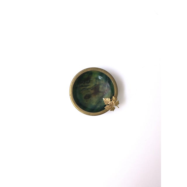 An Italian green alabaster marble and gilt brass ashtray, Midcentury Modern design period, circa mid-20th century, Italy....