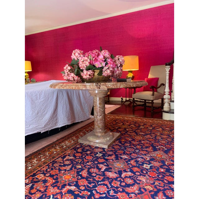 Italian pink marble table. Wear and tear. Good condition.