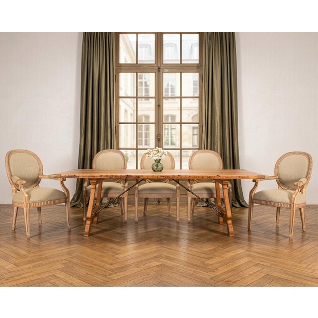 A beautifully crafted set of six Kreiss "Peninsula" oak dining armchairs crafted in a modern Louis XVI style. The iconic...