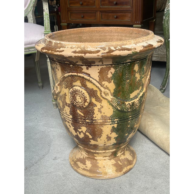 This a great example of a pair of Antique French Glazed Terracotta Planters made in Anduze France. The Potterie de la...