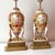 Pair of Italian porcelain hand painted portrait lamps with brass accents and tall silk barrel lamp shades by Benrose...
