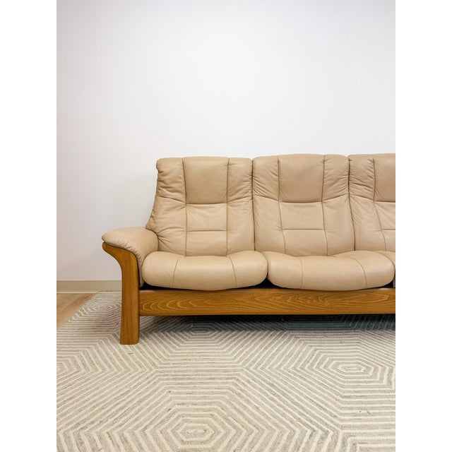 This impressive vintage Ekornes Stressless "Buckingham" 3-seater reclining sofa is a serious and highly sought-after find....