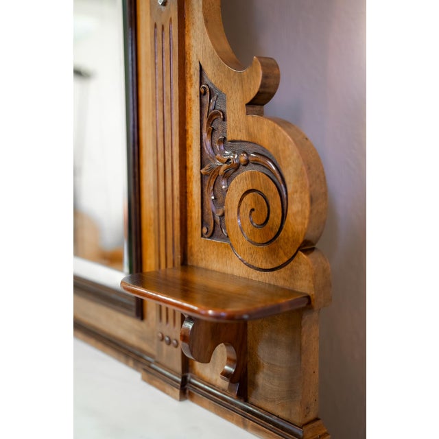 This late Victorian chest of drawers combines refinement and functionality. It is distinguished by a large, beveled mirror...