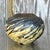 This vintage Boho-style studio pottery vase features a textured, organic design with sweeping patterns that evoke the...
