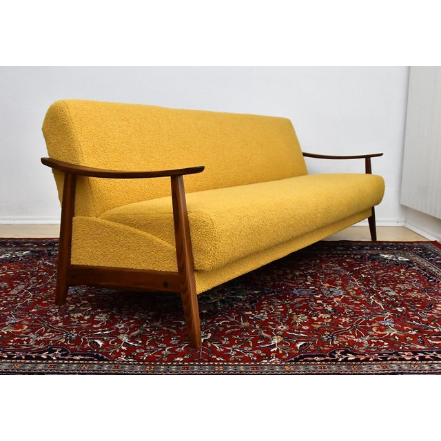 Scandinavian sofa from the 1960s has undergone a complete restoration and embodies timeless mid-century design. It was...