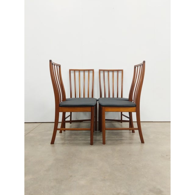 Set of 4 authentic vintage mid century modern dining chairs. By A.H. McIntosh Ltd (unmarked). This set is in excellent...