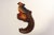 Circa 1920s American painted chalkware bird/pheasant in vibrant red, orange, black, and brown palette. These figurines...