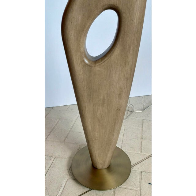 Stylish Abstract Modern Beige solid Wood Almyra floor Lamp, white fabric shade, satin brass base, showroom floor sample