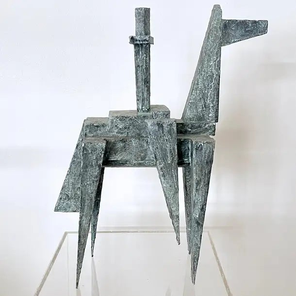 Cubist abstract mixed-media sculpture titled 'Horse and Rider' was created using various materials including wood, papier-...