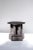 T02 coffee table by ia kutateladze one of a kind. Dimensions: d 38 x h 37 cm. Materials: black clay. Each piece is one of...