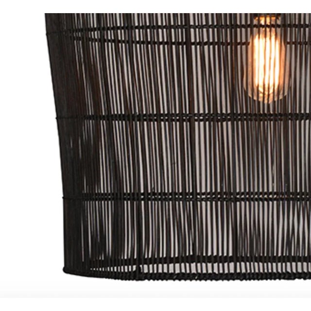 Black rattan and iron dome pendant light. Modern elegant option perfect for a variety of spaces. 100 watt max fixture,...