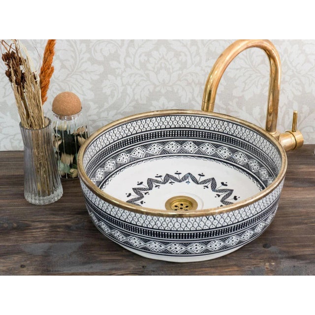 Our Moroccan Ceramic Sink is stunning addition to elevate your bathroom decor. Handcrafted with meticulous attention to...