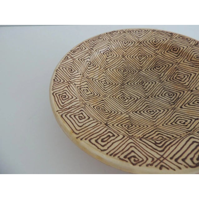 Round Brown and Tan Graphic Pattern Moroccan Plates - Set of 2 Hand painted terracotta with hanging hold on the back. Deep...