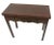English mahogany one drawer flip top tea table. Shaped apron, straight chamfered legs. Brass bail pulls.180016x 34 x 29...