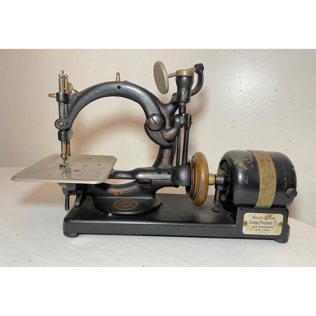 Up for sale is a rare working antique 19th century cast iron Depose sewing machine by Willcox & Gibbs with electric...
