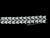 Offering a 1950-60’s vintage bracelet with a repeating leaf design by Coro. It has a fold-over clasp, safety chain, and a...