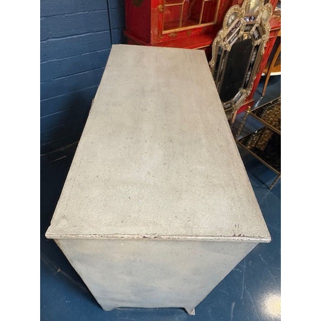 The Painted Swedish Chest is a piece of furniture that combines antique charm with unique painted detailing. This dresser...