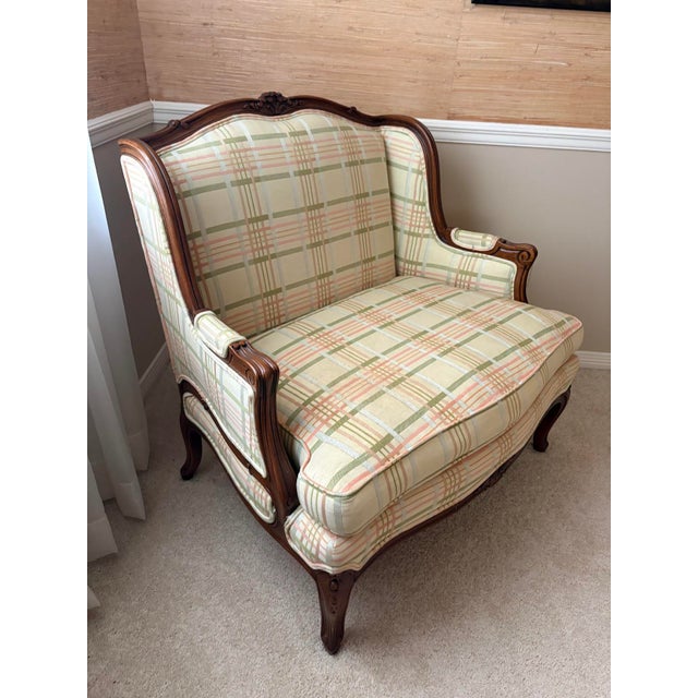 1950s-60s French-style oversized plaid upholstered armchair w/ wood frame/border. Some very minor fading on seat...