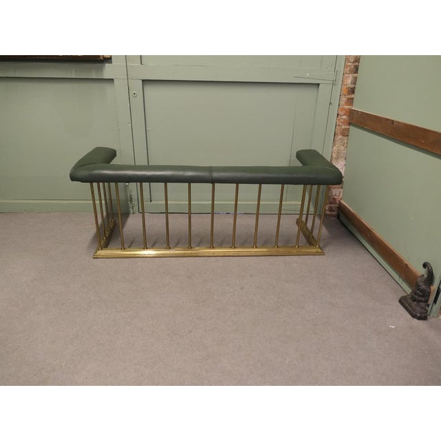 This is a genuine piece of Country House Decorative Furnishing the fender is in brass with its original green Leather...
