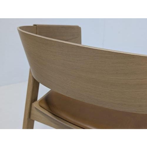 Referencing the values of honest craftsmanship and Scandinavian materiality, the Cover Armchair is an elegant perspective...