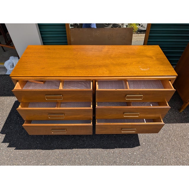 Attractive low dresser from the Drexel Cascade bedroom set line from the 1960s. Walnut finish with a lovely grain pattern,...