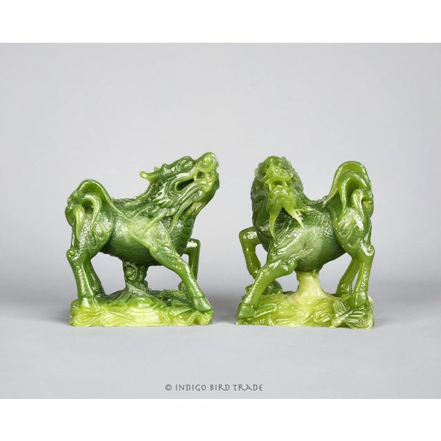 Pair of Vintage Foo Dog Statues These Chinese Foo dog figurines are made in beautiful Jade color and feature lots of...