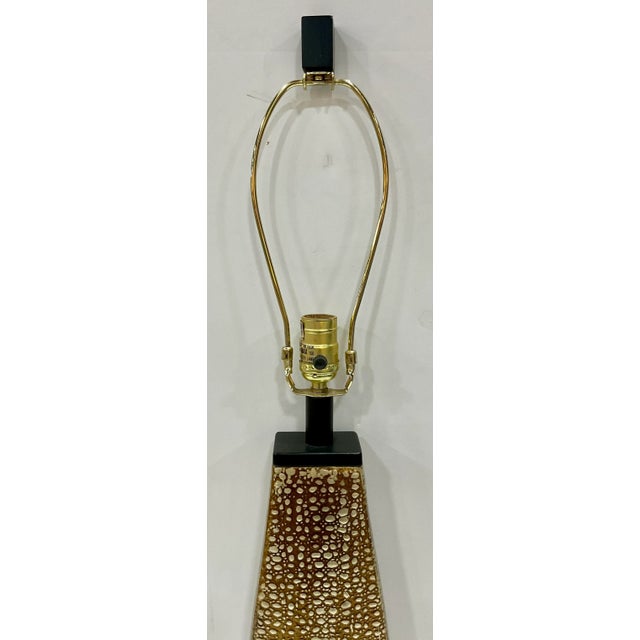 Stylish Currey & Company Champagne Reptile Pattern Metal Table Lamp, black base, showroom floor sample