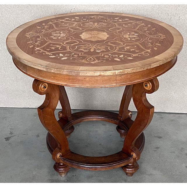 20th marquetry round center table with four cabriole legs. We have two pieces available. Details Dimensions Height: 30.12...