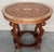20th marquetry round center table with four cabriole legs. We have two pieces available. Details Dimensions Height: 30.12...