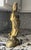 Vintage cast brass Guanyin (Kwan Yin), the Bodhisattva of Compassion, standing atop a beautifully detailed fish and wave...