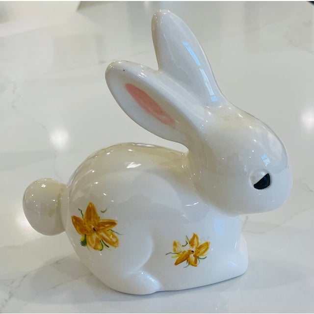 This charming ceramic bunny figurine was hand-painted. The piece features a glossy white glaze with beautifully executed...