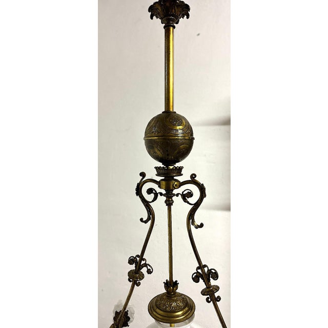 Antique Brass and Glass 7-Light Chandelier from H. Luppens Bruxelles, 1920s, in Very Good conditions. Designed 1920 to...