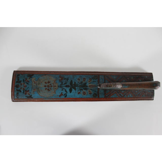 Danish mangle board (clothing and bedding press) dated 1823. Made of wood with hand-carved edge and horse as handle....