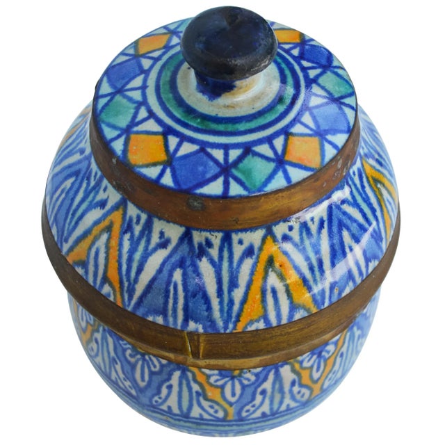 Handcrafted and glazed polychrome ceramic box from Fez, Morocco. Featuring an intricate hand-painted Moorish pattern with...