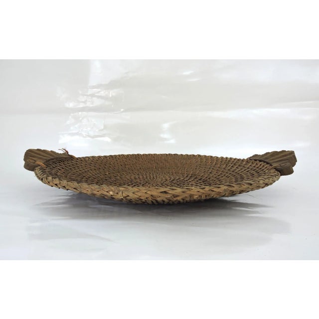 Large Vintage Hapao Rattan Circular Storage or Display Basket / Tray With Hand Carved Wood Handles For Sale - Image 4 of 5
