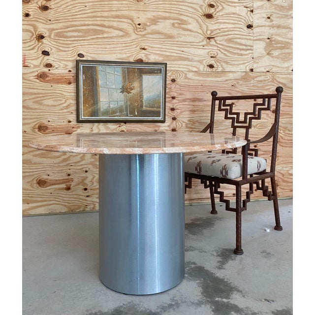 Italian Peach + Ivory marble on a spun steel cylindrical base. The perfect statement table in a breakfast area or dining...